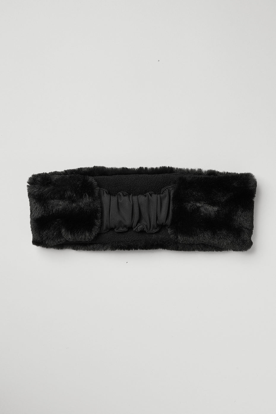 Ear warmers styled with a winter coat for a chic look