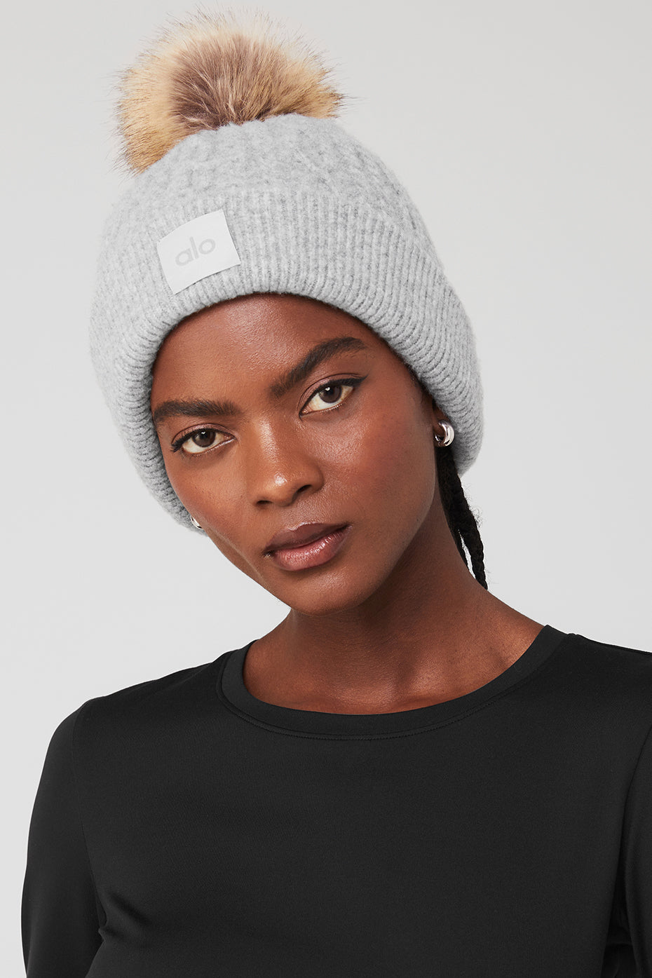 Faux fur pom detail on heather grey beanie