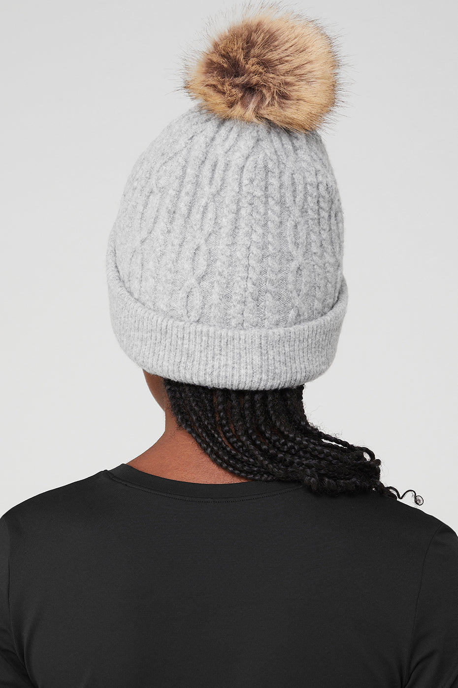 Close-up of cozy cable knit beanie in heather grey