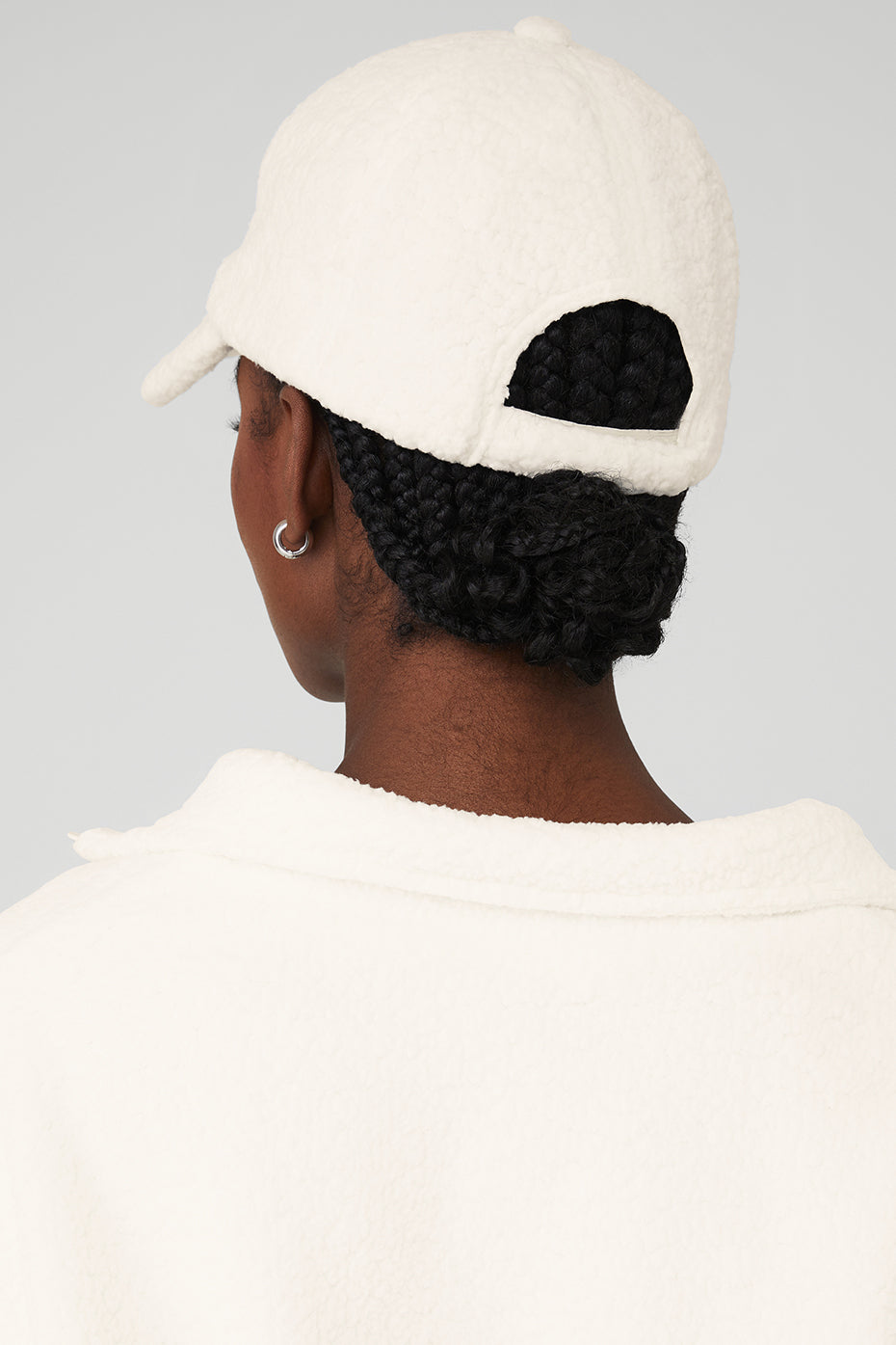 Side view showcasing the adjustable Velcro strap of the dad hat.