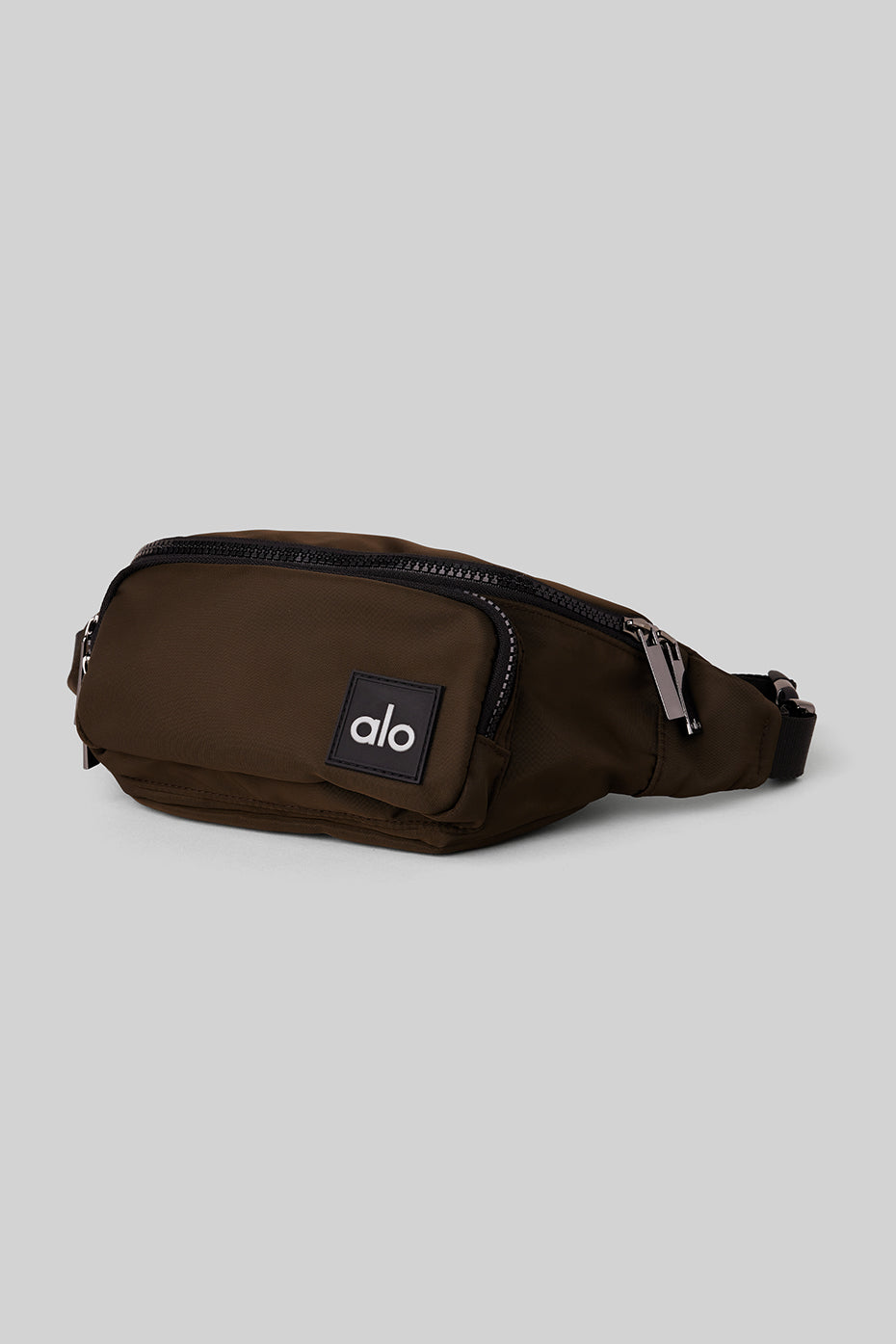 Detail of the adjustable strap on the Explorer waist bag, perfect for hands-free travel.