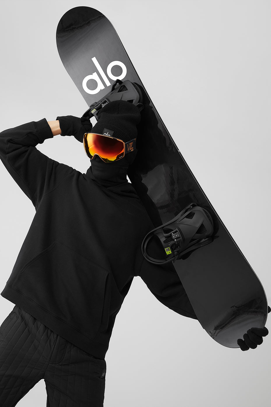 ALO Glacier Freestyle Snowboard angled view, showcasing its sleek design.