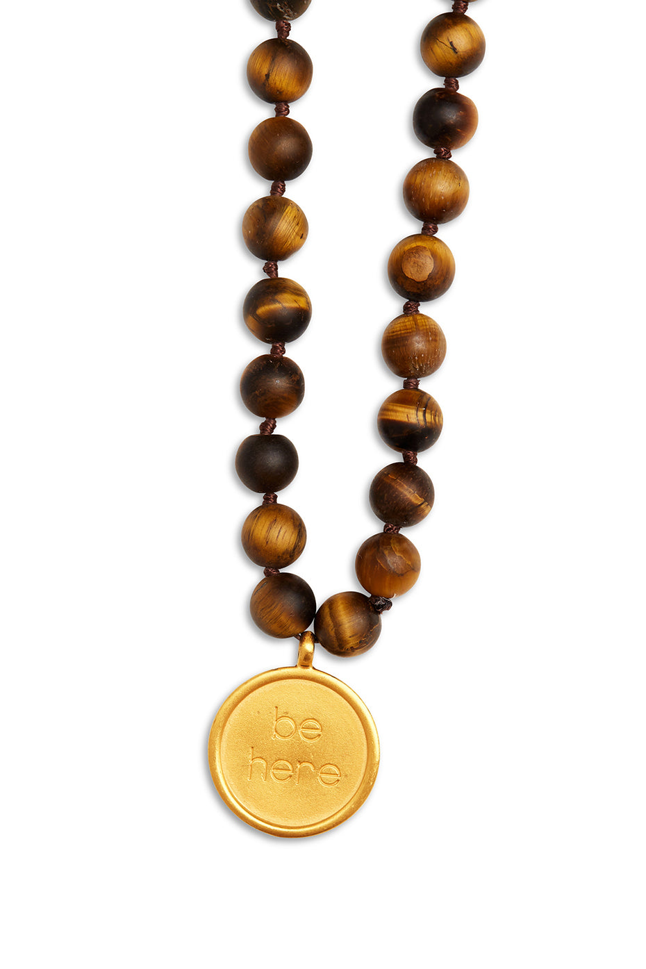 Close-up of Tiger's Eye mala necklace showcasing 108 beads and gold pendant.