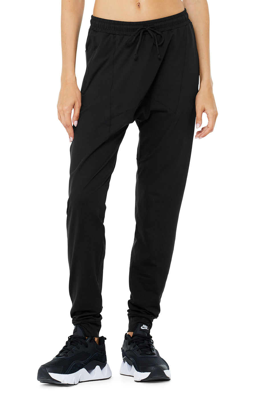 Front view of black Revive Comfort Performance Pants, ideal for yoga.