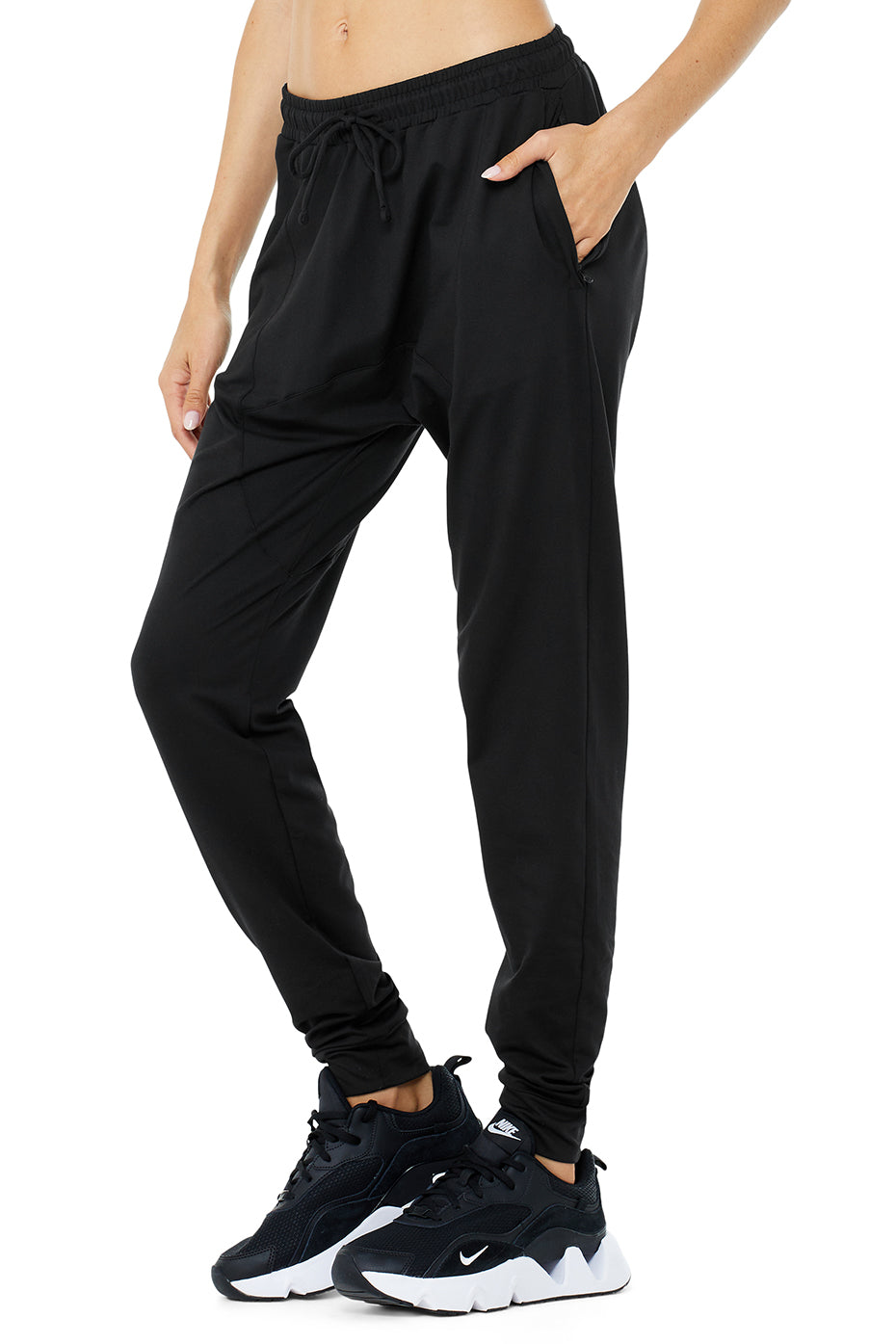 Back view highlighting zip pockets of Revive Comfort Performance Pants.