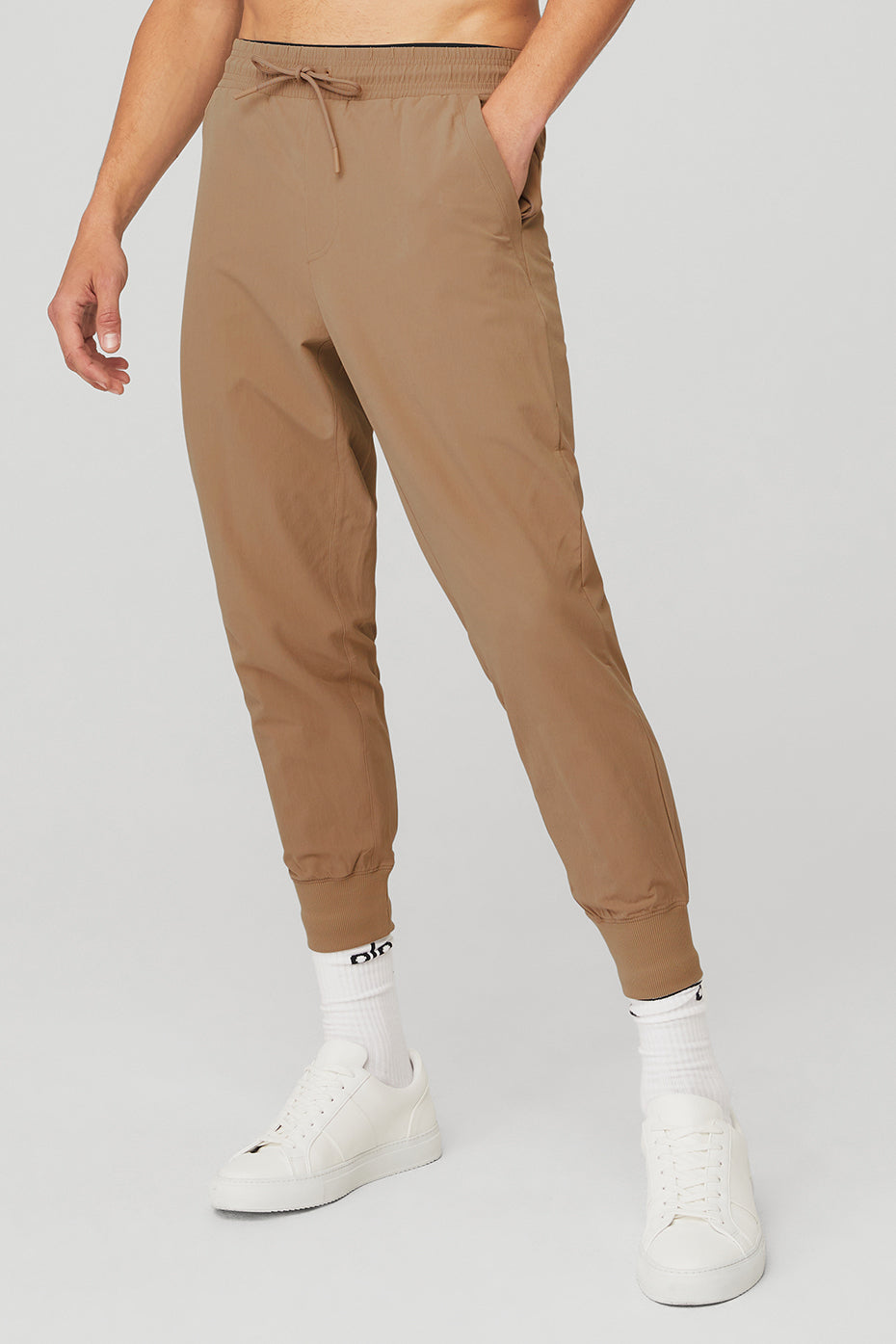 Urban Explorer 7/8 water-repellent pants in gravel color, perfect for hiking.
