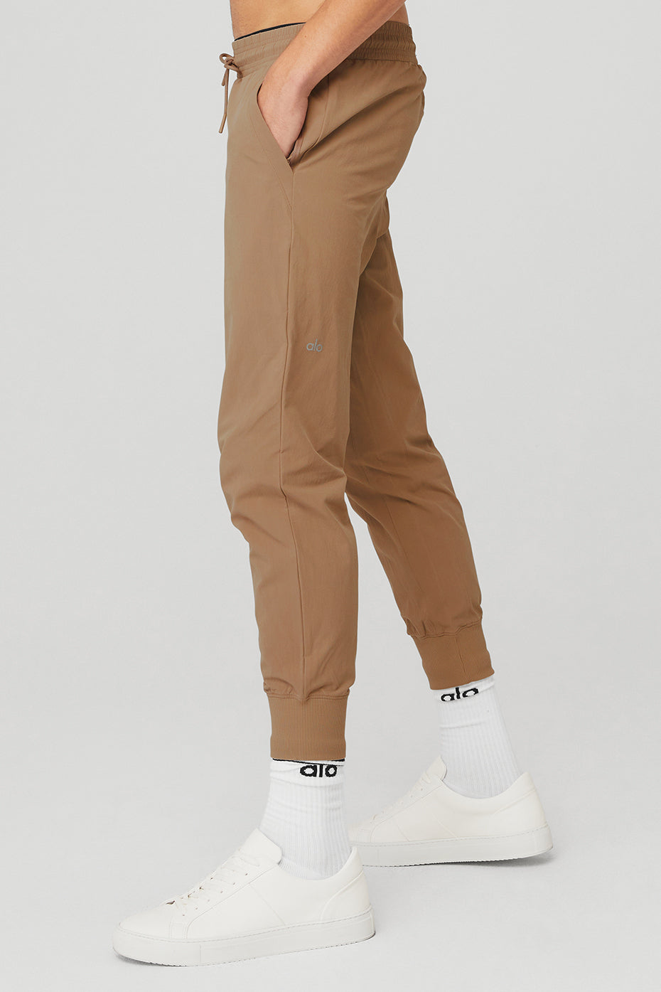 Back view showcasing the single back pocket of the water-repellent pants.