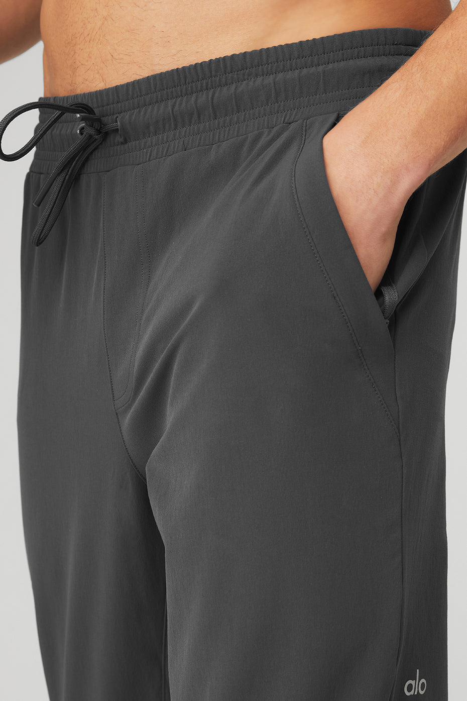 Front view of lightweight water-repellent cargo pants for women.
