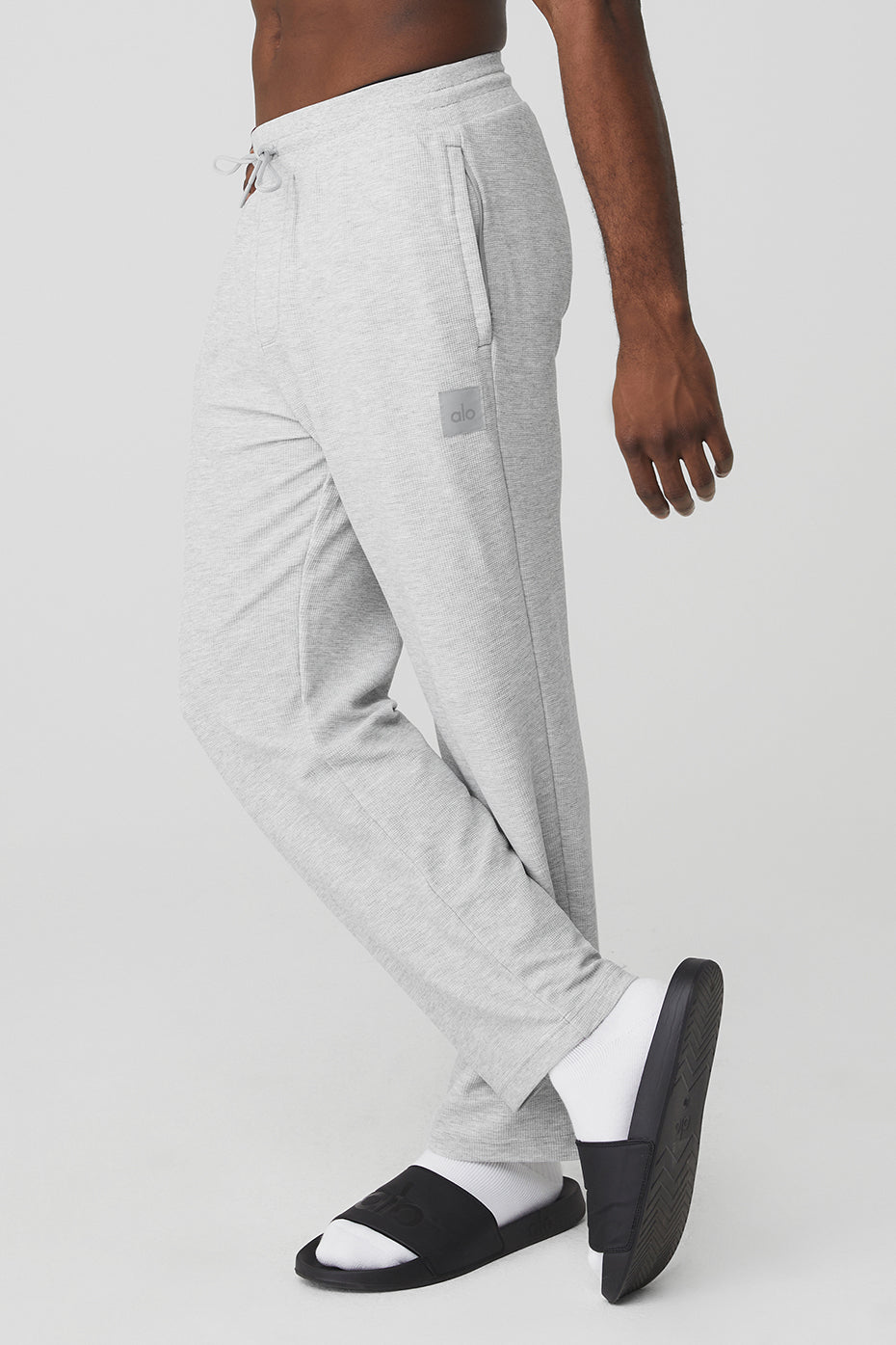 Model showing the straight-leg fit with elastic waistband and zippered pockets