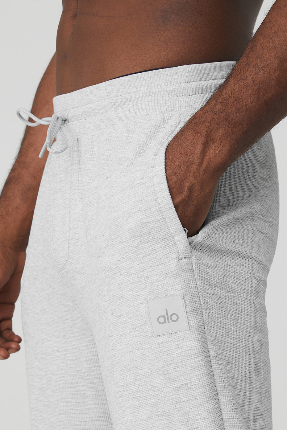 Men and women wearing Micro Waffle Sweatpants for casual outdoor activities