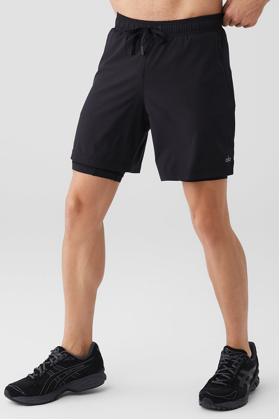 Detail of the invisible zip pockets on the Unity workout shorts.