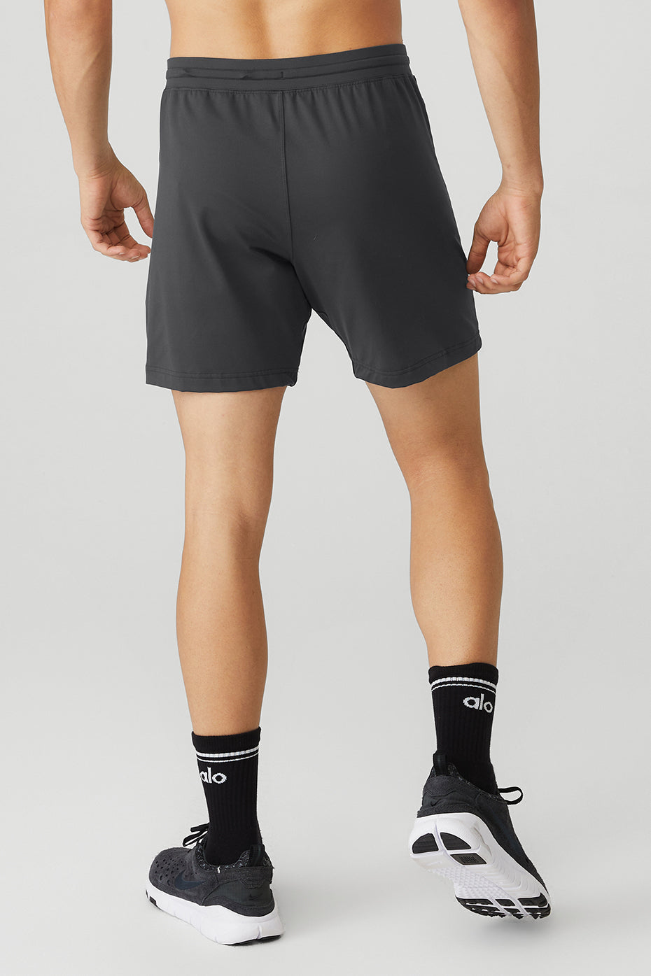 Side-angle closeup of zippered pocket on mens shorts camouflage variant