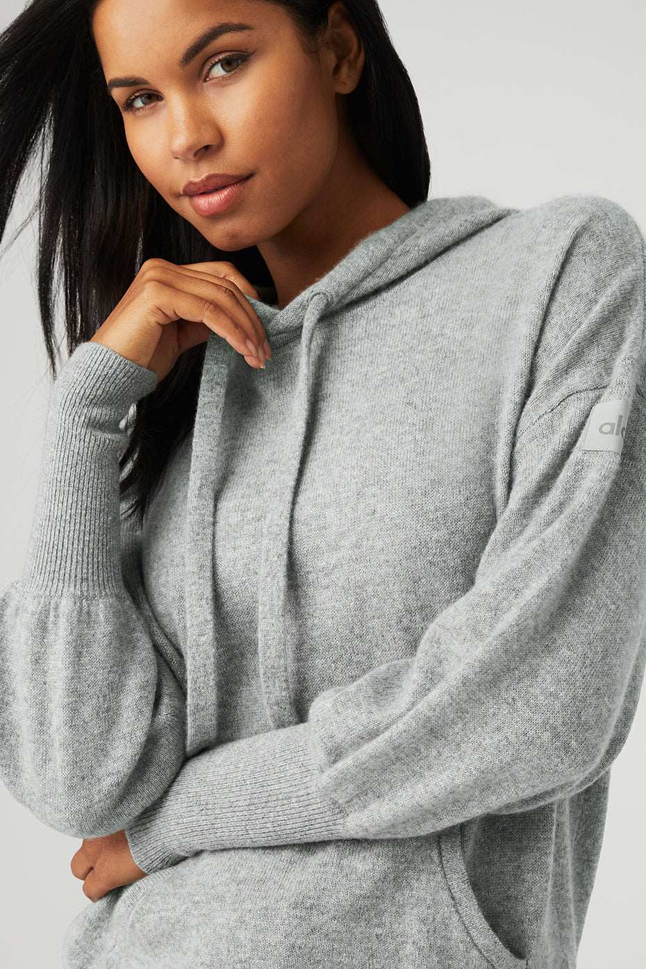 Close-up texture of dove grey cashmere hoodie fabric