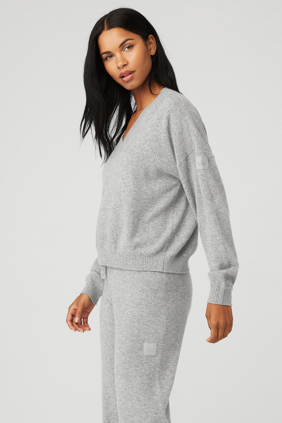 Close-up of the cashmere cardigan sweater texture and dove grey knit details
