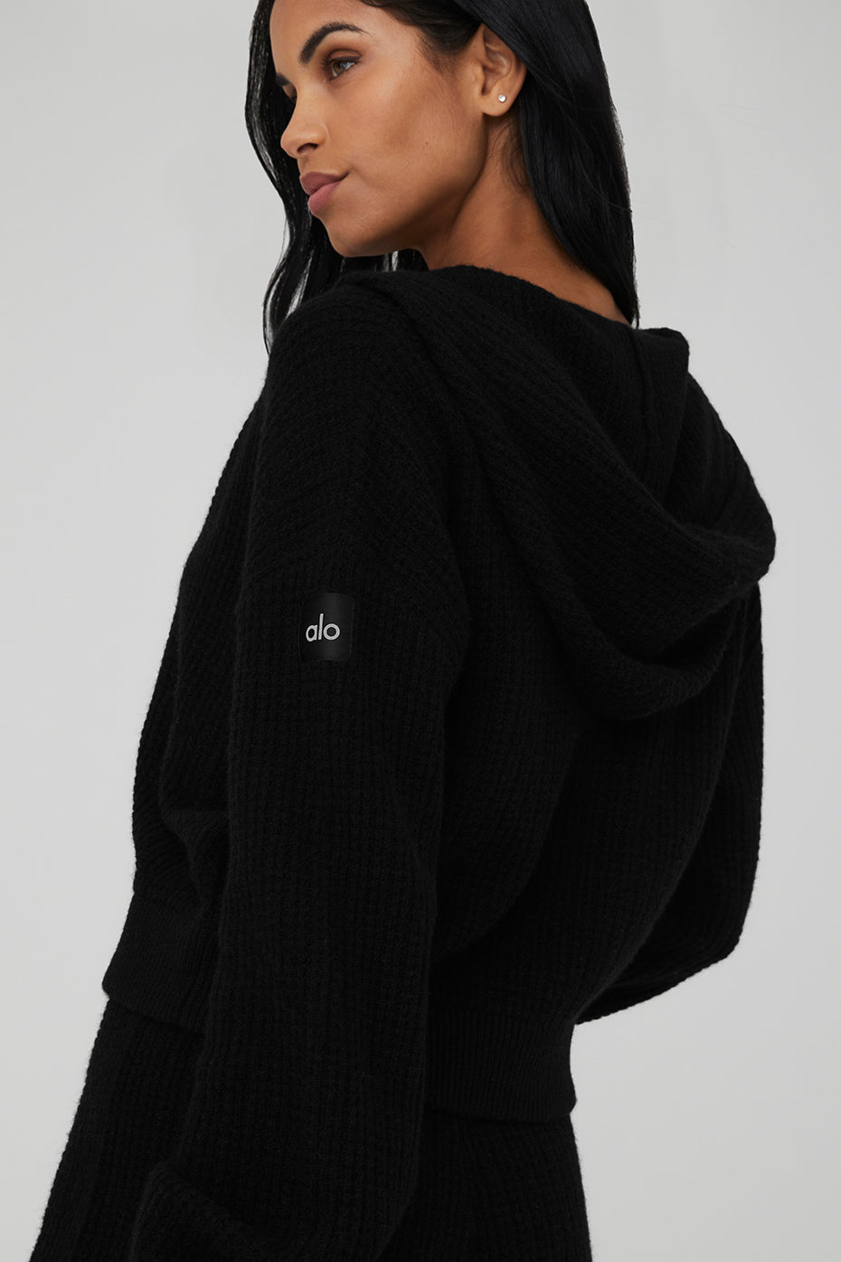 Side view of the cashmere hoodie women love, ideal for casual outings.