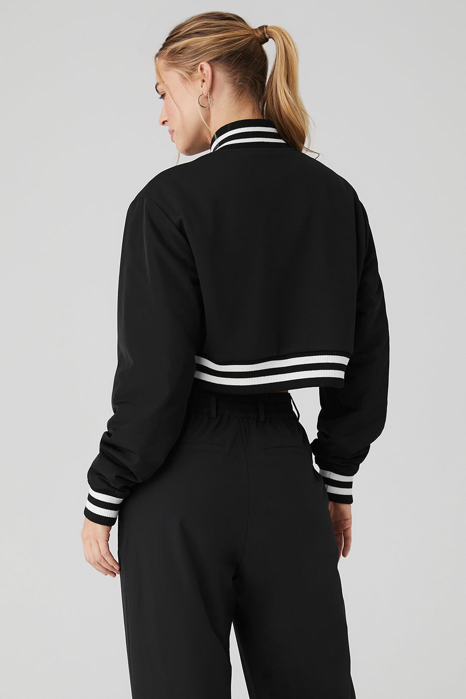 Model wearing the cropped puffer jacket, perfect for a casual outing.