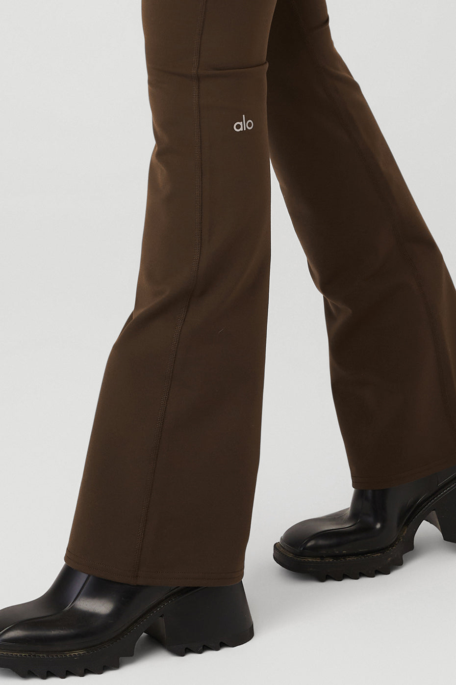 Front view of sculpting high-waist bootcut leggings in espresso.