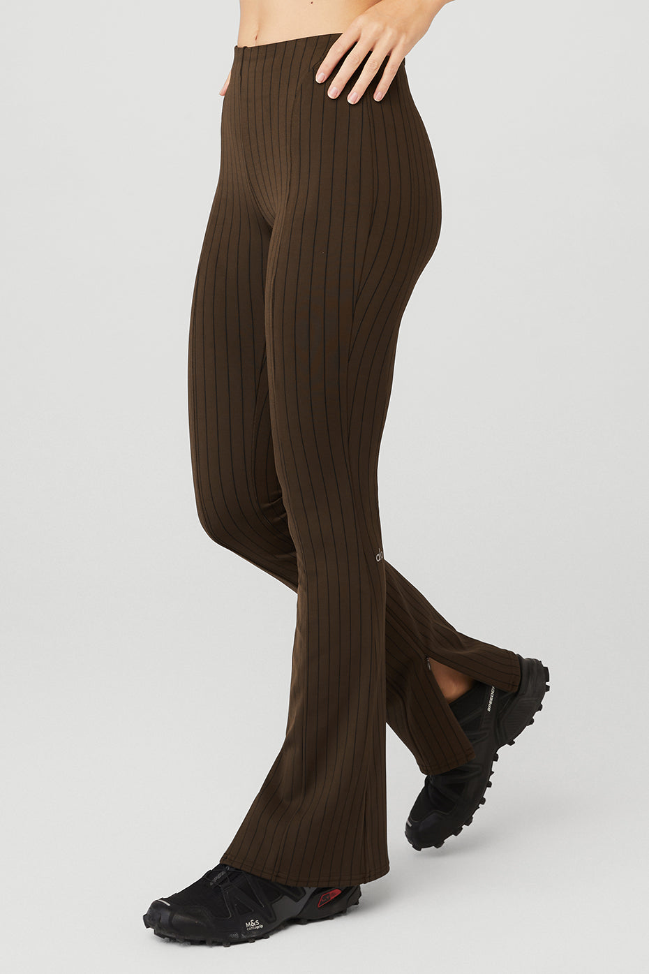 Model showcasing the flowing wide leg pinstripe trousers for casual or formal outfits