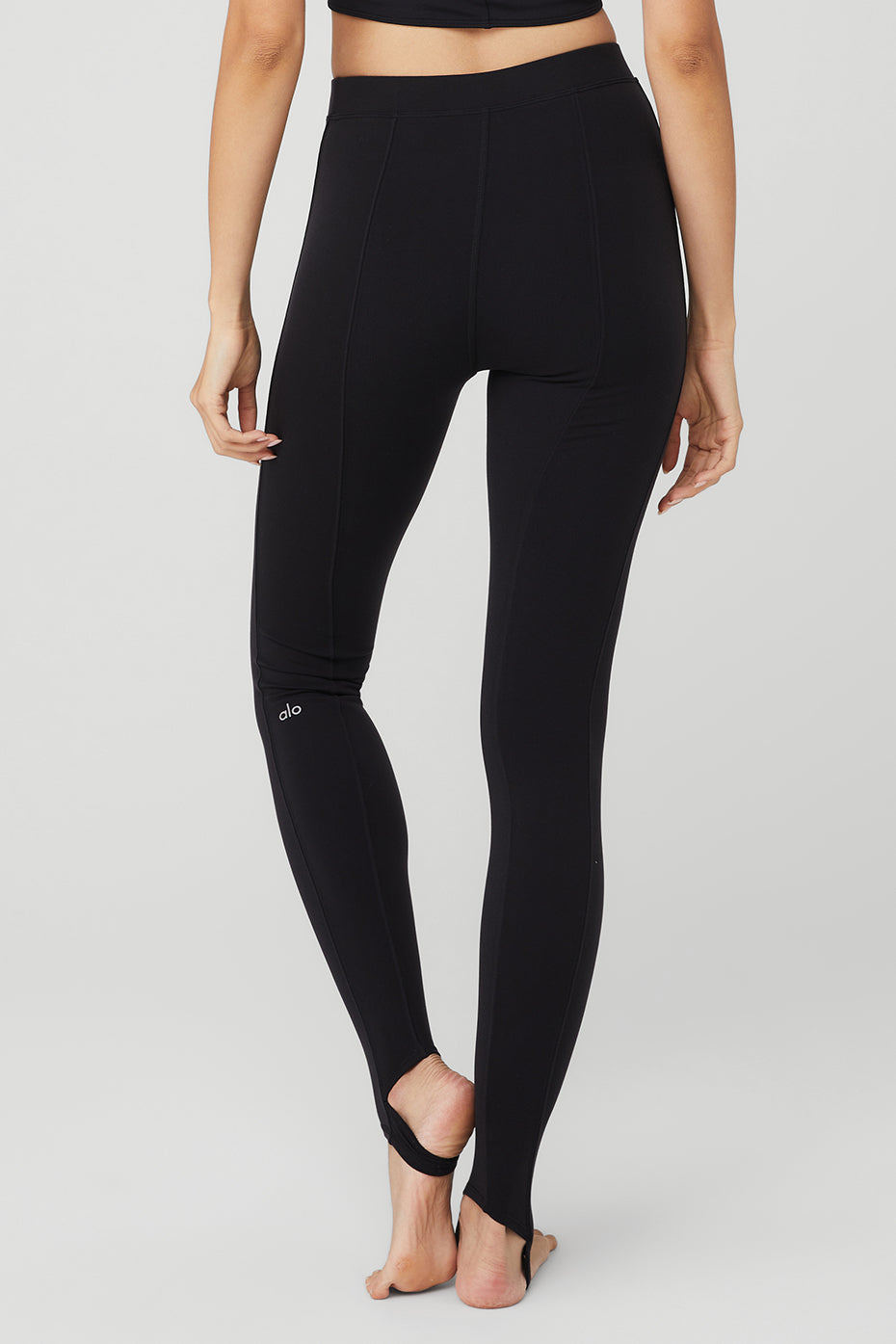 Close-up of the smooth waistband on black airbrush leggings.