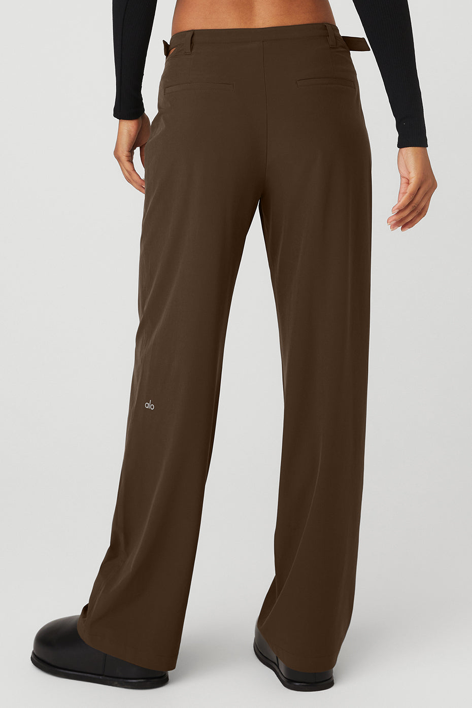 Side angle of womens pants styled with pullover for a casual street look