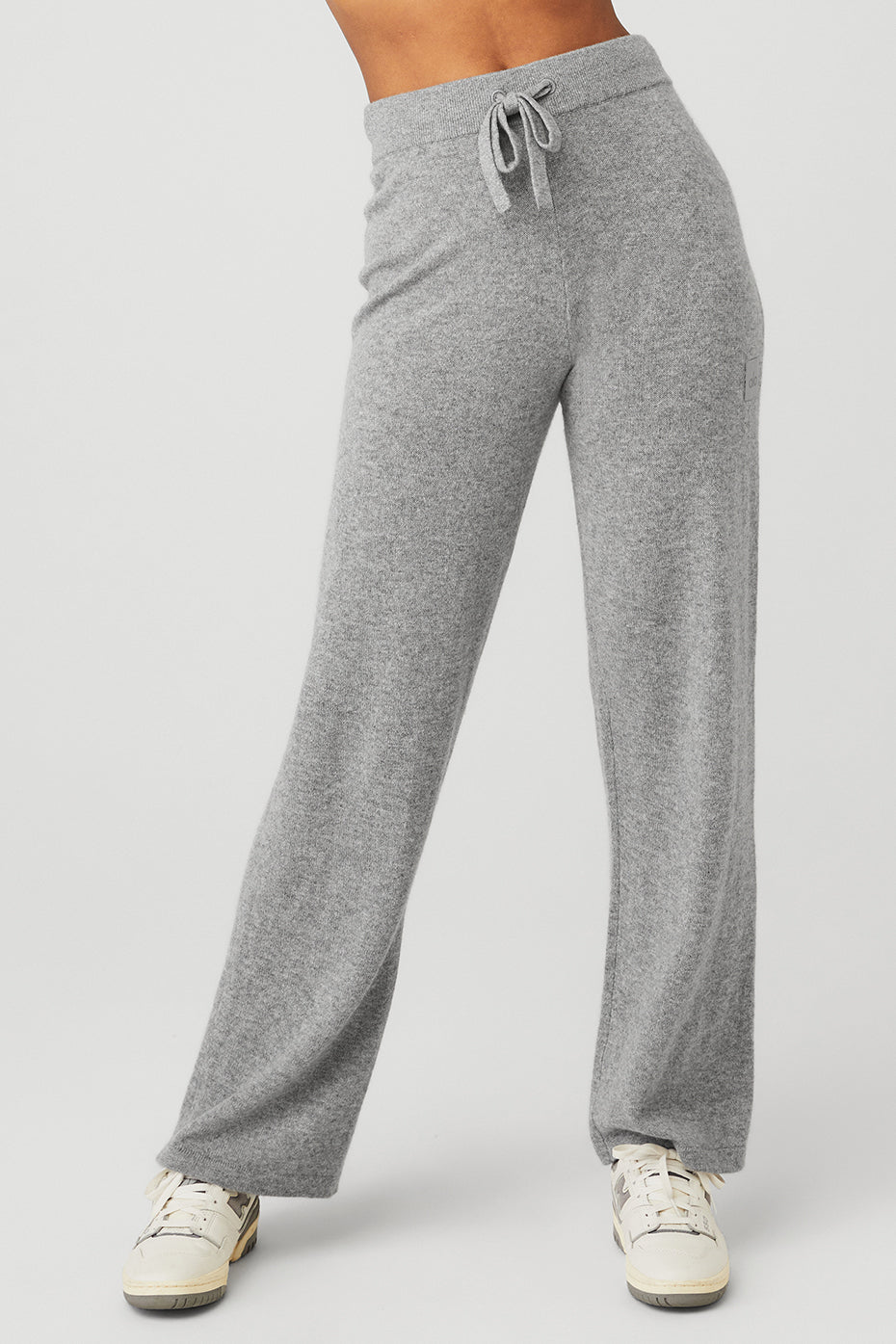 Front view of dove grey wide leg cashmere pants styled with a matching top