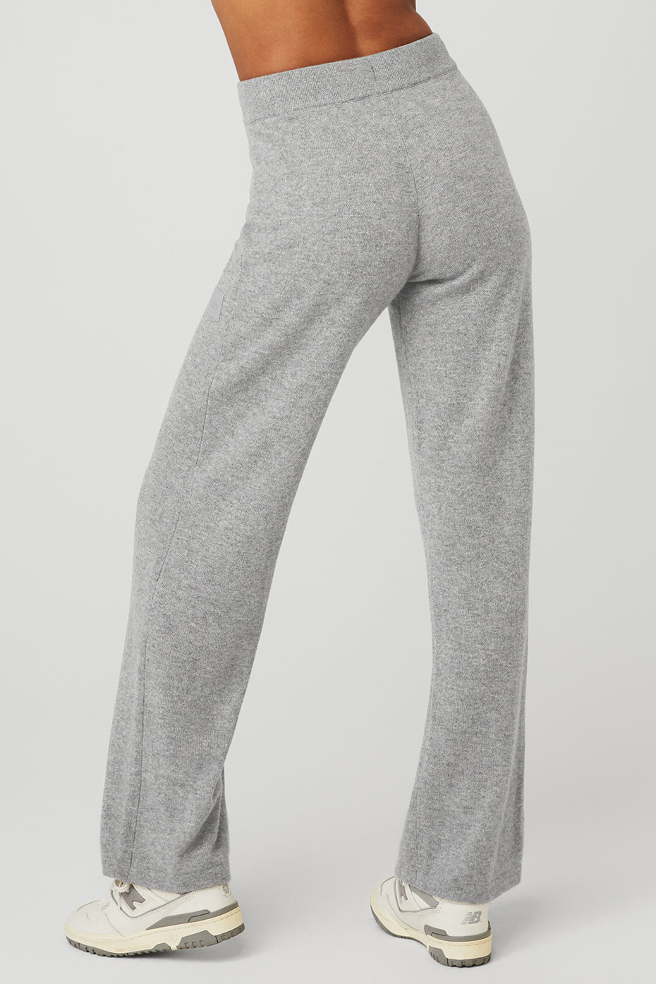 Close-up of elastic waistband on wide leg yoga pants in cashmere
