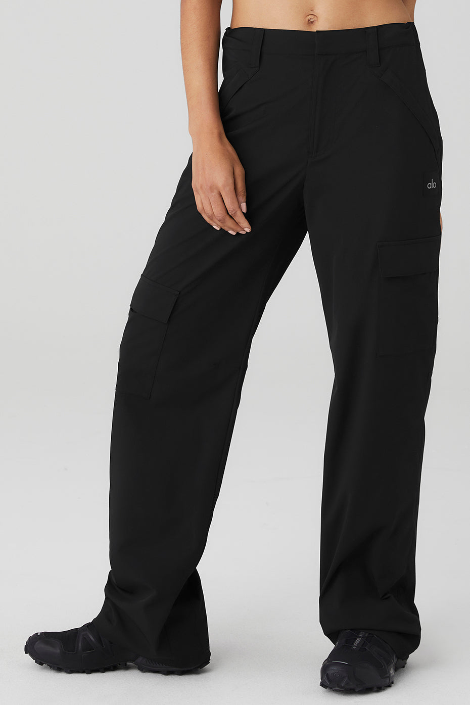 High-waist black trousers styled with a blazer for office wear
