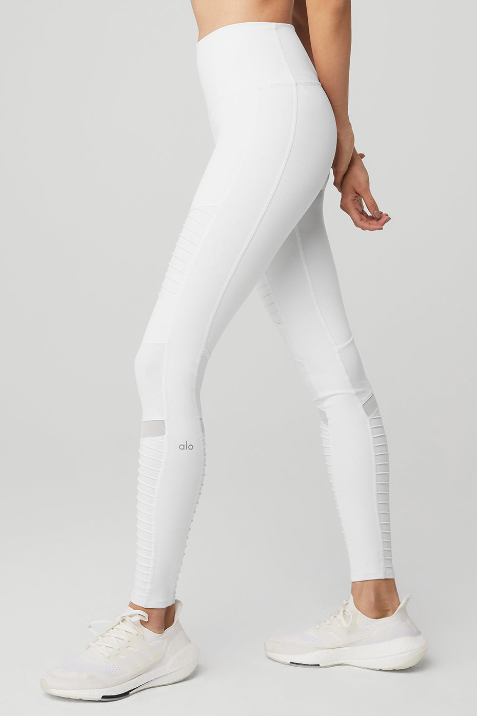 Back view highlighting waistband and shine-matte contrast of sculpt leggings