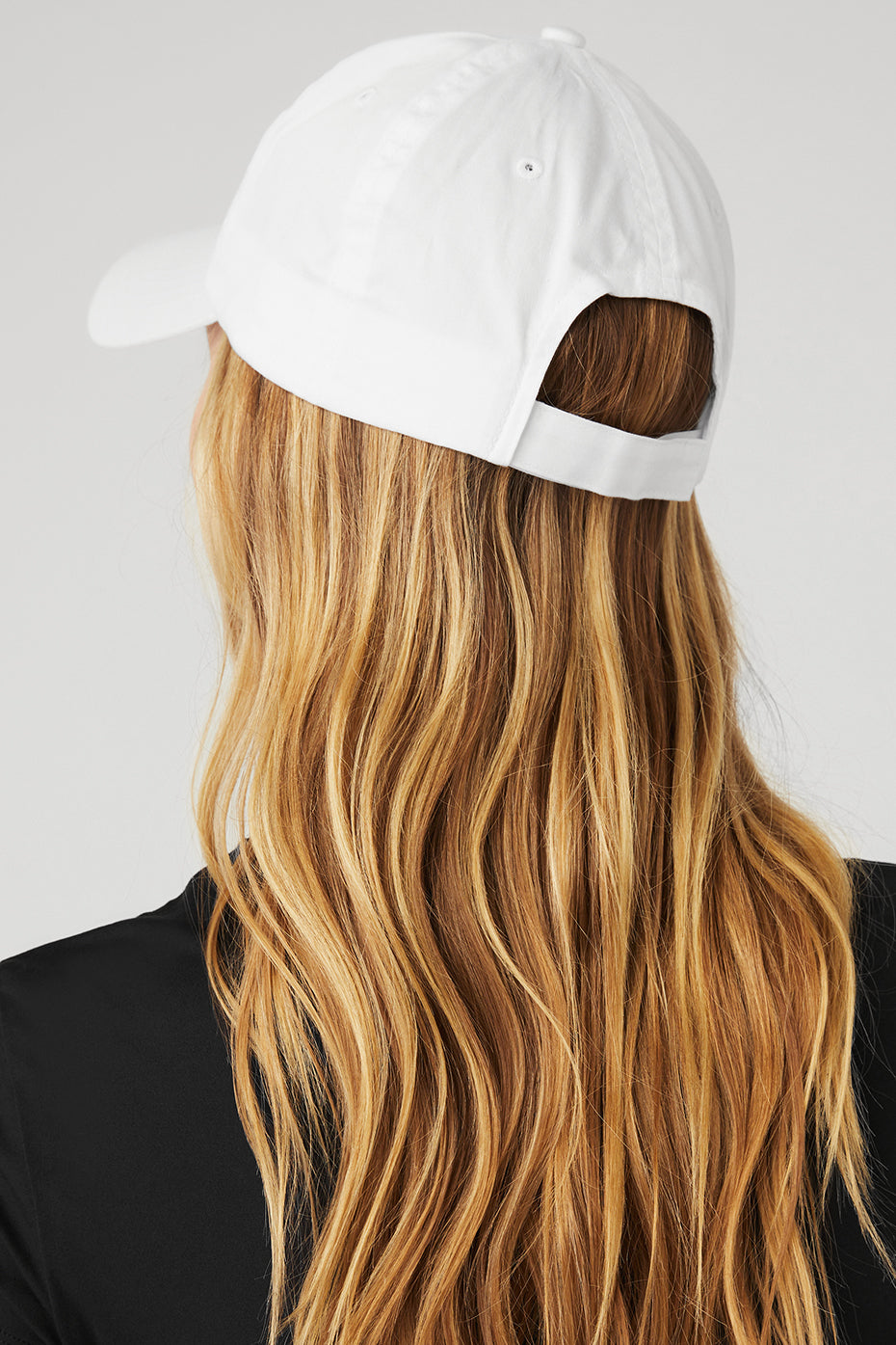 Side view of the adjustable dad cap for men in bright white