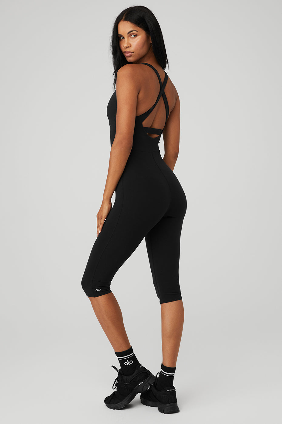 Seamless sculpt bodysuit detail showing waist contouring