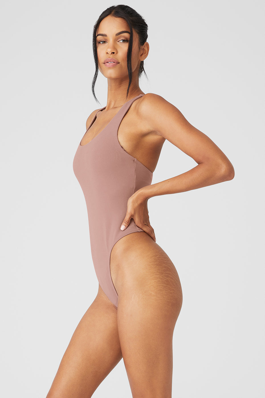 Close-up of the fabric texture of the Sculpting Airbrush Bodysuit.