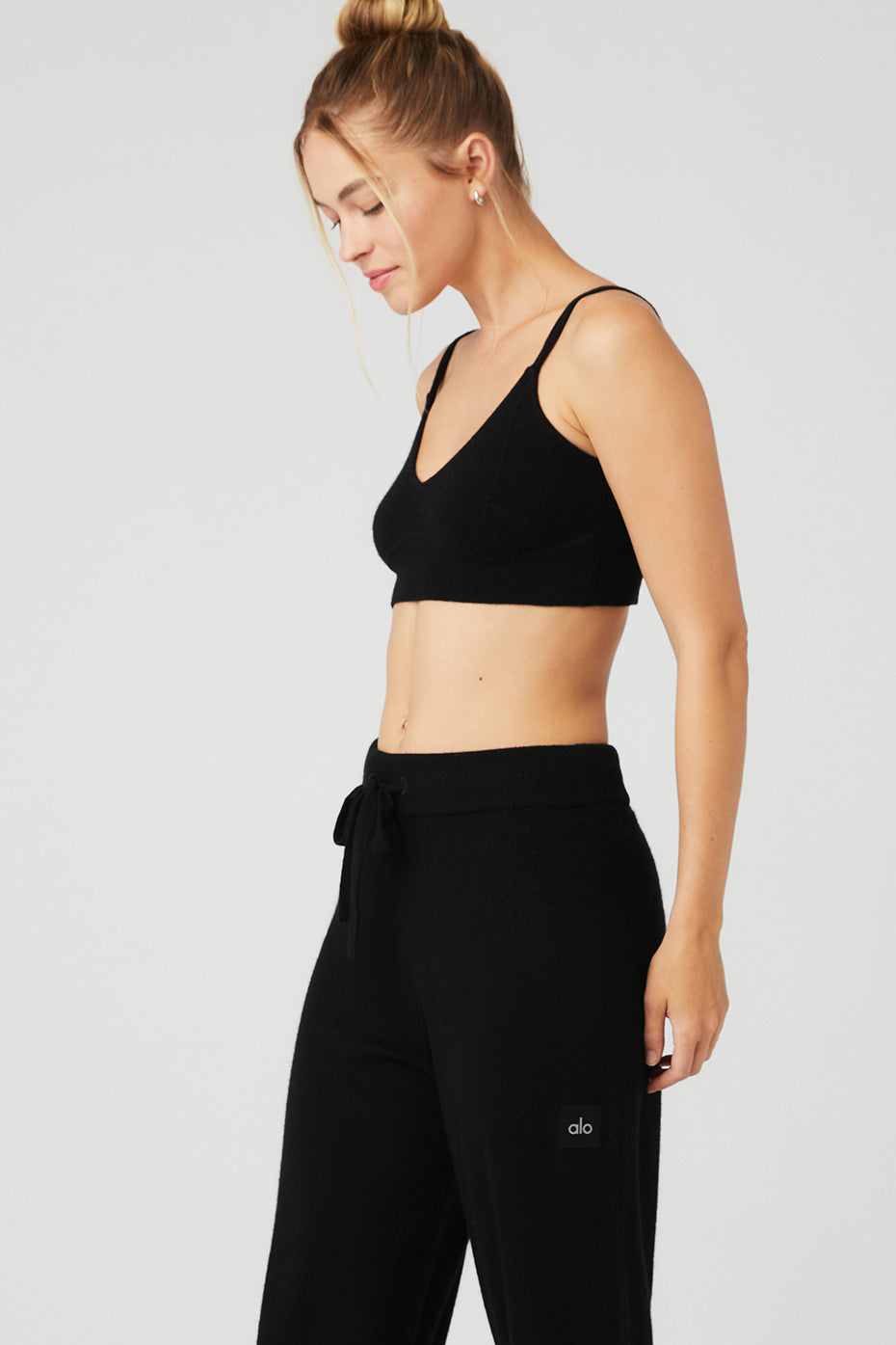Model wearing the cashmere comfort bra layered with matching cashmere pants and sweater.