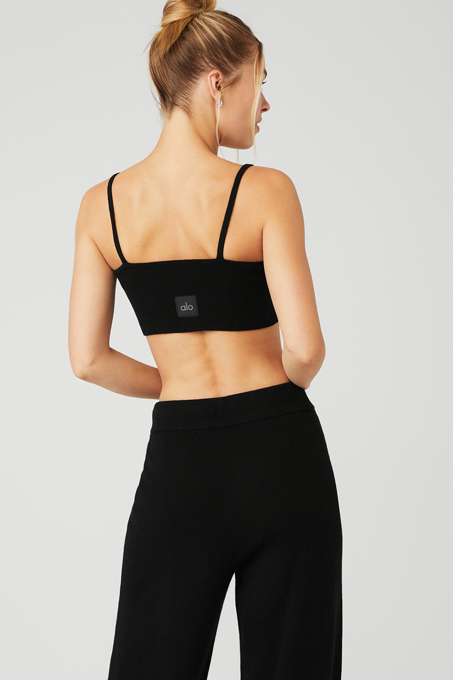 Side view of the cashmere bra, highlighting the delicate straps and soft fabric.
