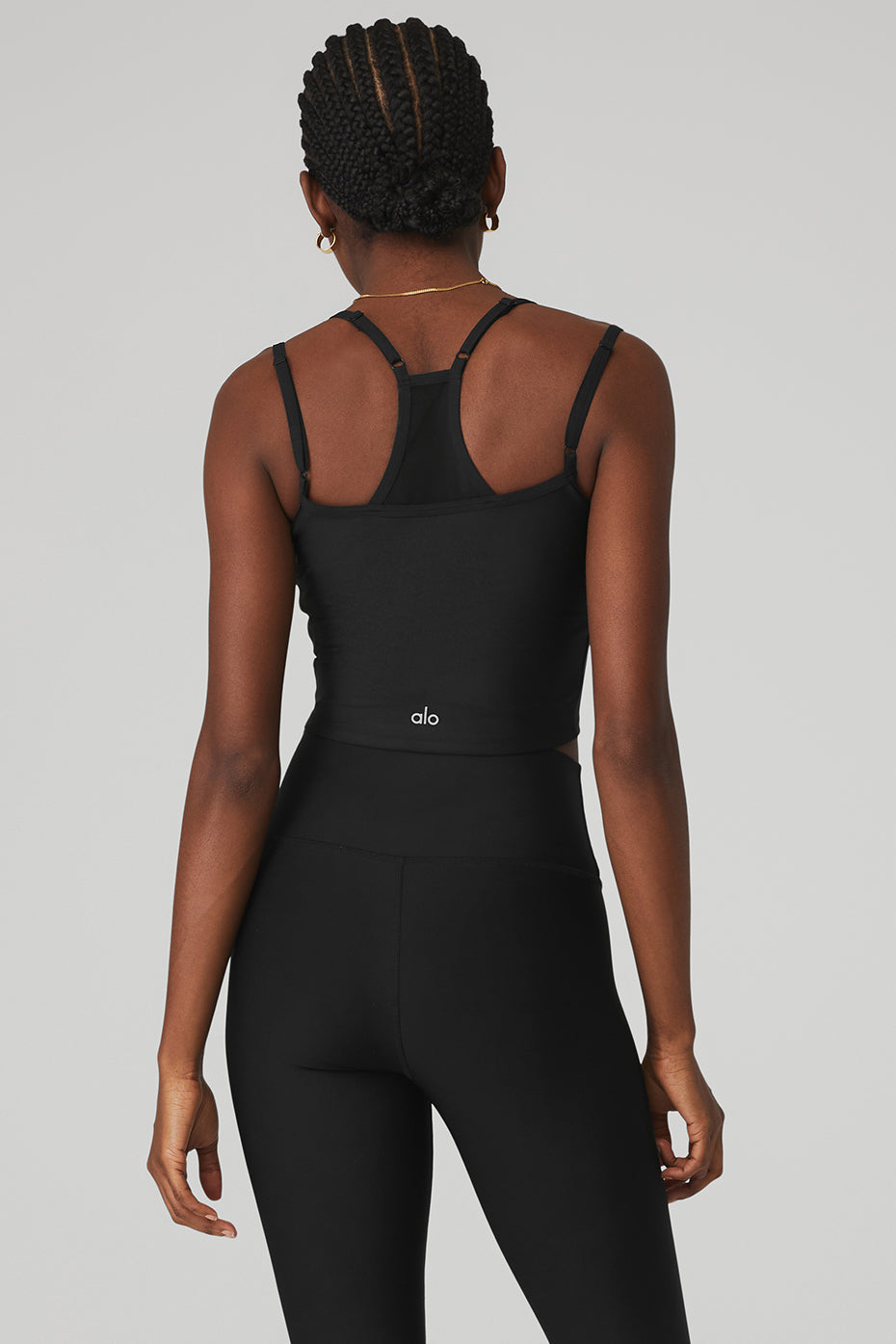 Side view of the Airlift Double Check Bra Tank, highlighting the mesh details and fitted style.