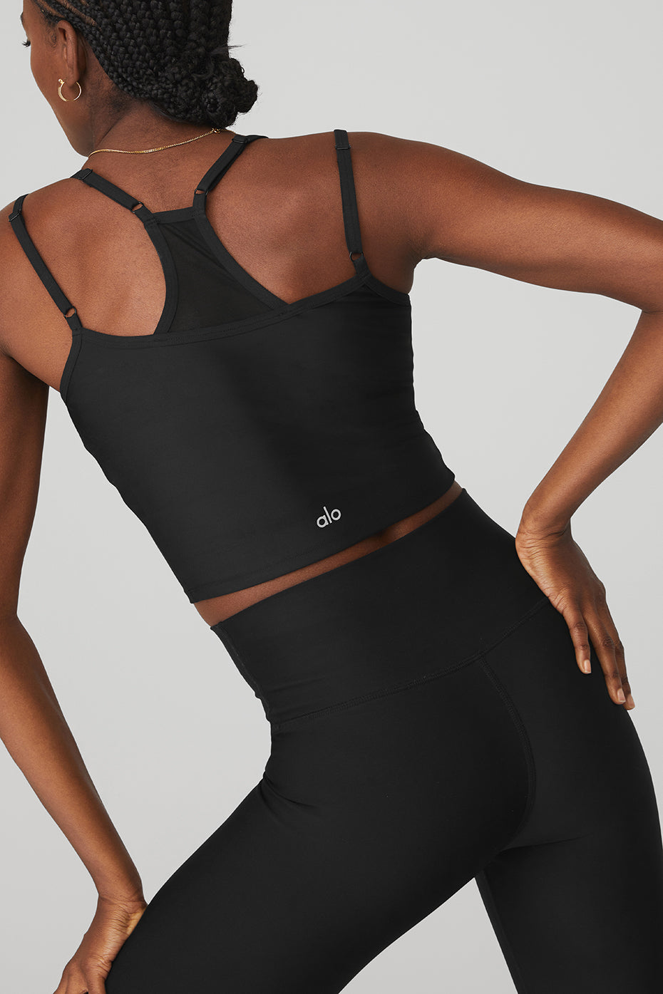 Front view of the Airlift Double Check Bra Tank in black, showcasing its racerback design.
